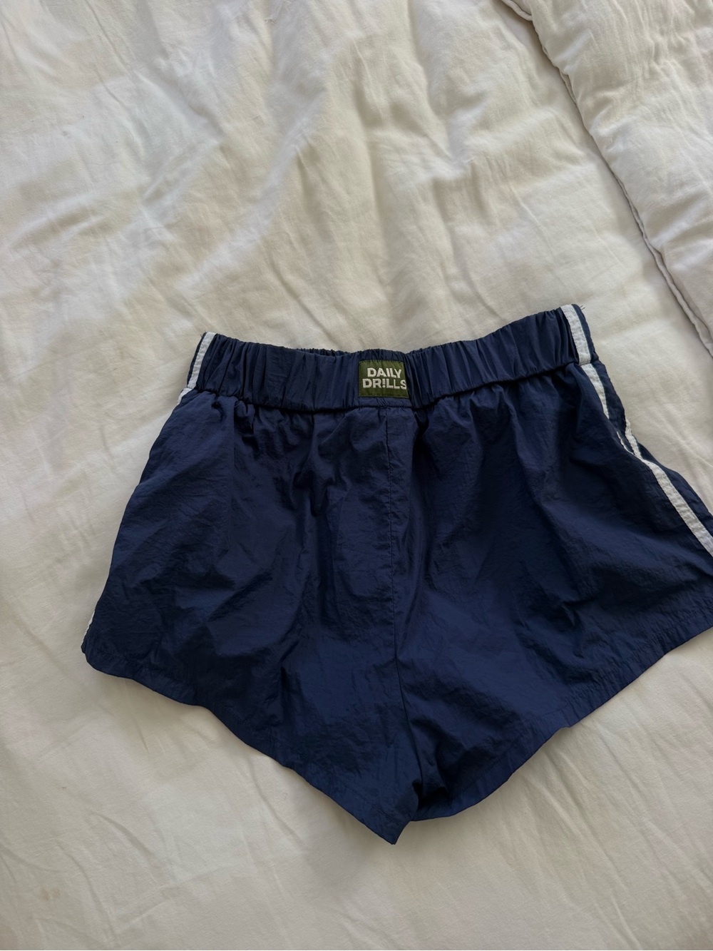 Daily Drills Navy Women's Athletic Shorts with White Side Stripe